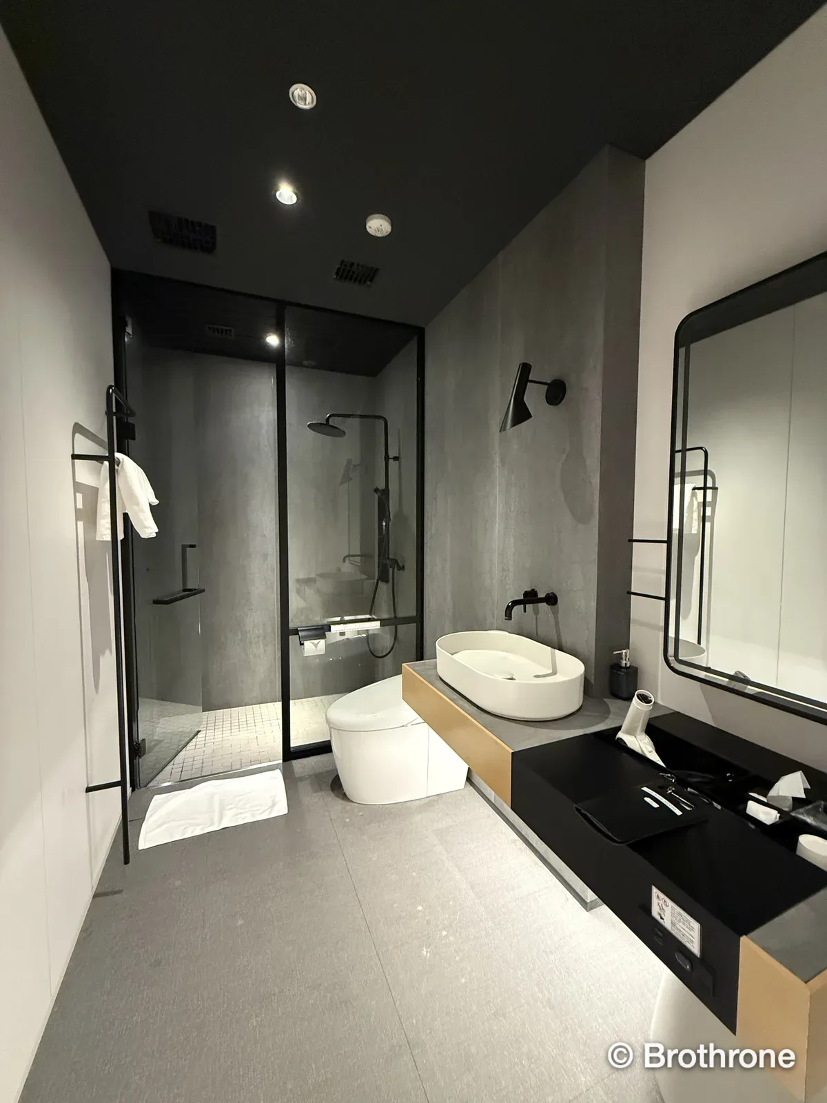 Clean and modern shower suite inside the Power Lounge