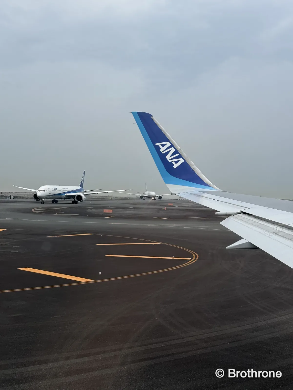 Wing view from the window seat preparing for takeoff