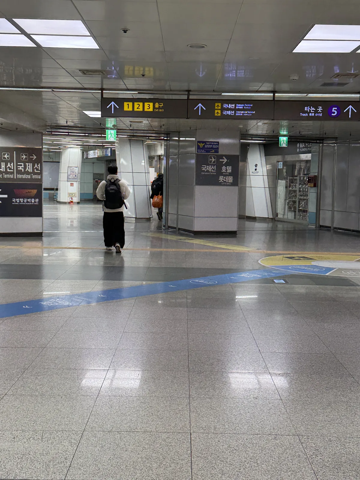 Gimpo Airport international terminal interior with check-in counters