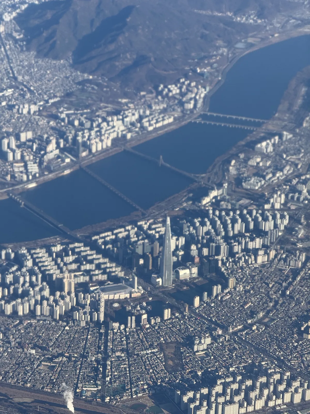 Aerial view of Seoul and the Han River shortly after takeoff from Gimpo Airport