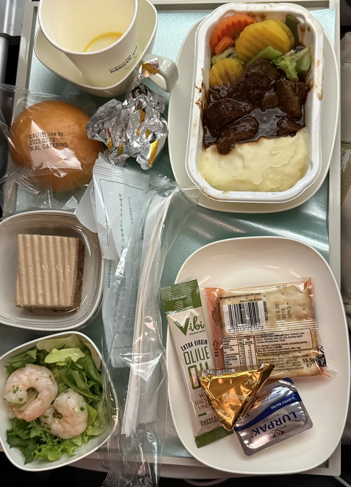 Korean Air economy class first meal — Western option with main dish and side