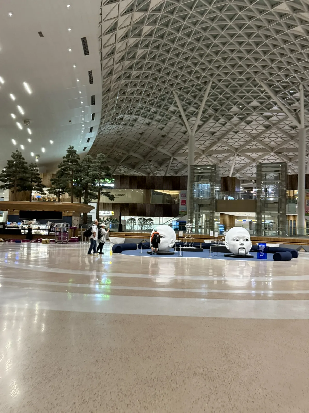 Large sculpture installation in the late-night airside area of T2