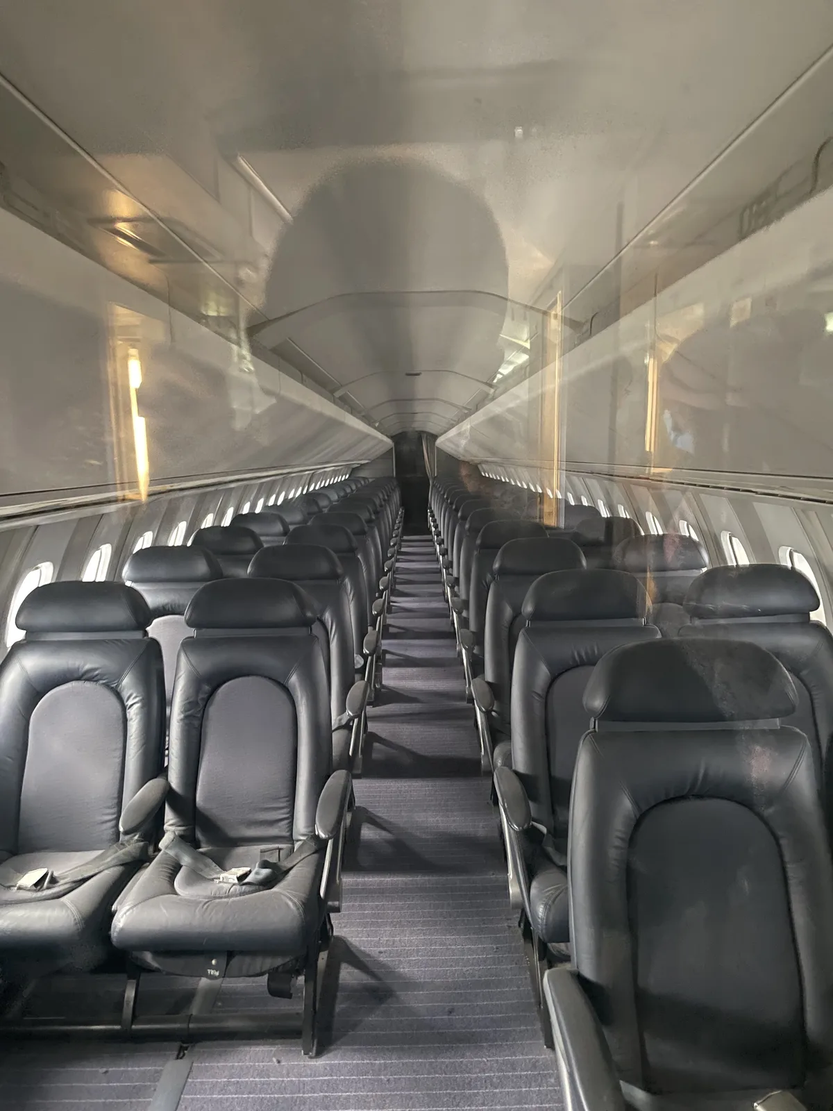 Concorde interior cabin showing the narrow two-class seating arrangement