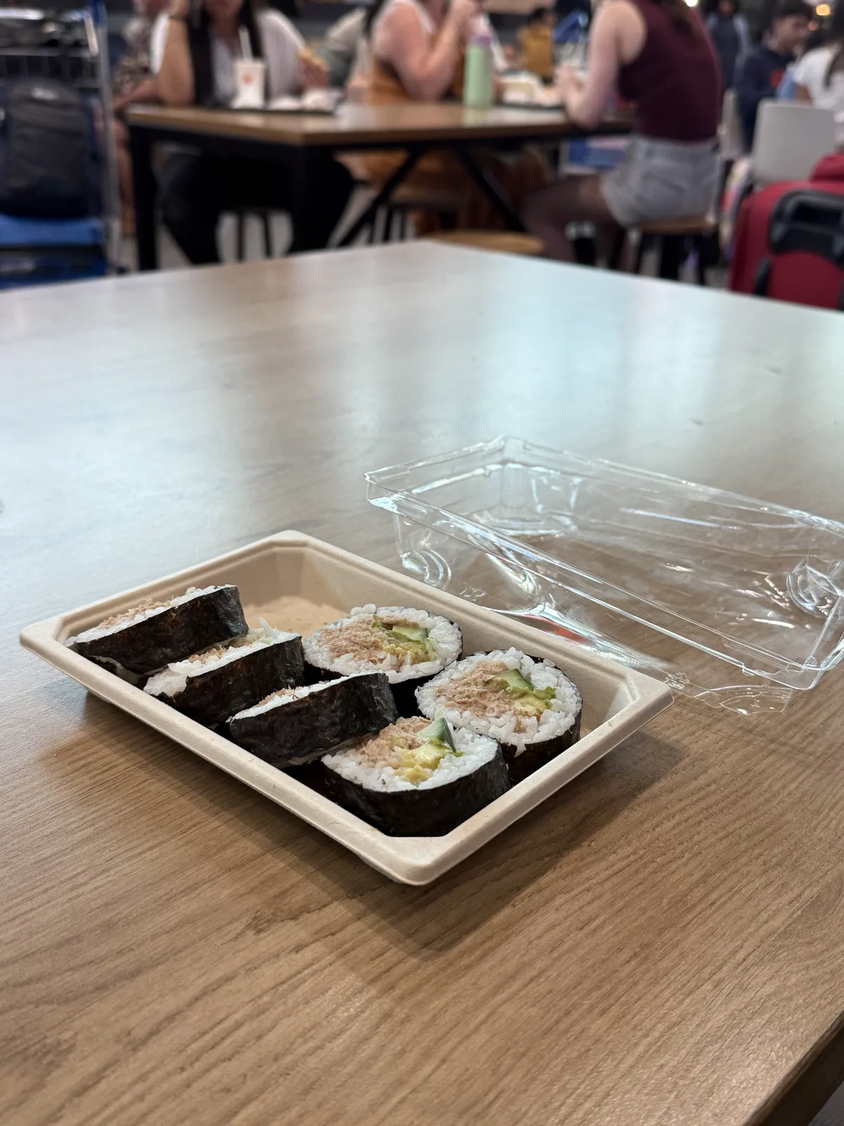 Auckland Airport domestic terminal food court with Korean kimbap restaurant