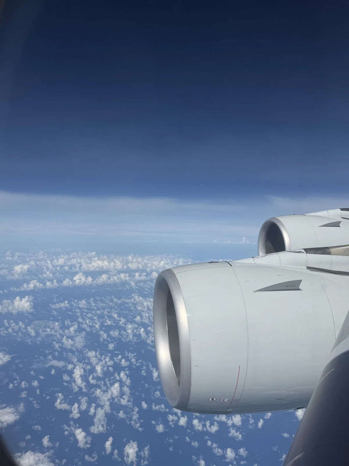 Aerial view over Indonesian islands during descent into Singapore