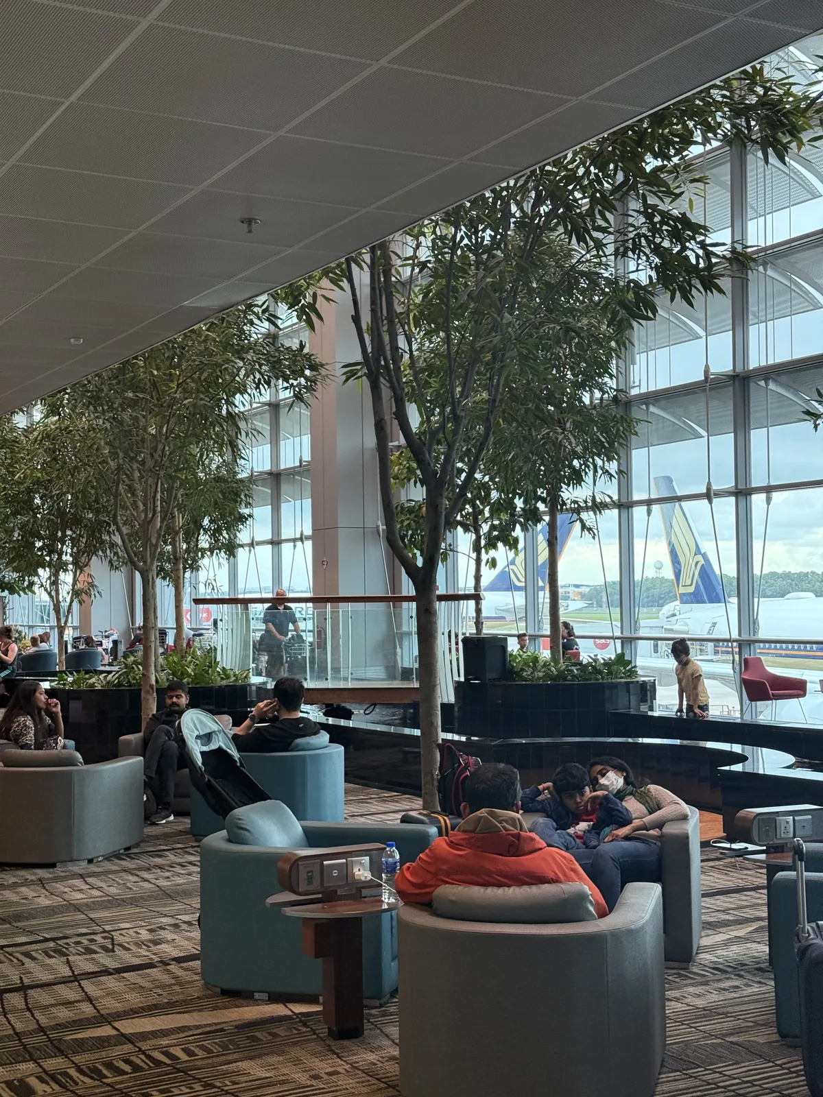 Singapore Changi Airport Terminal 3 interior with high ceilings and open atrium