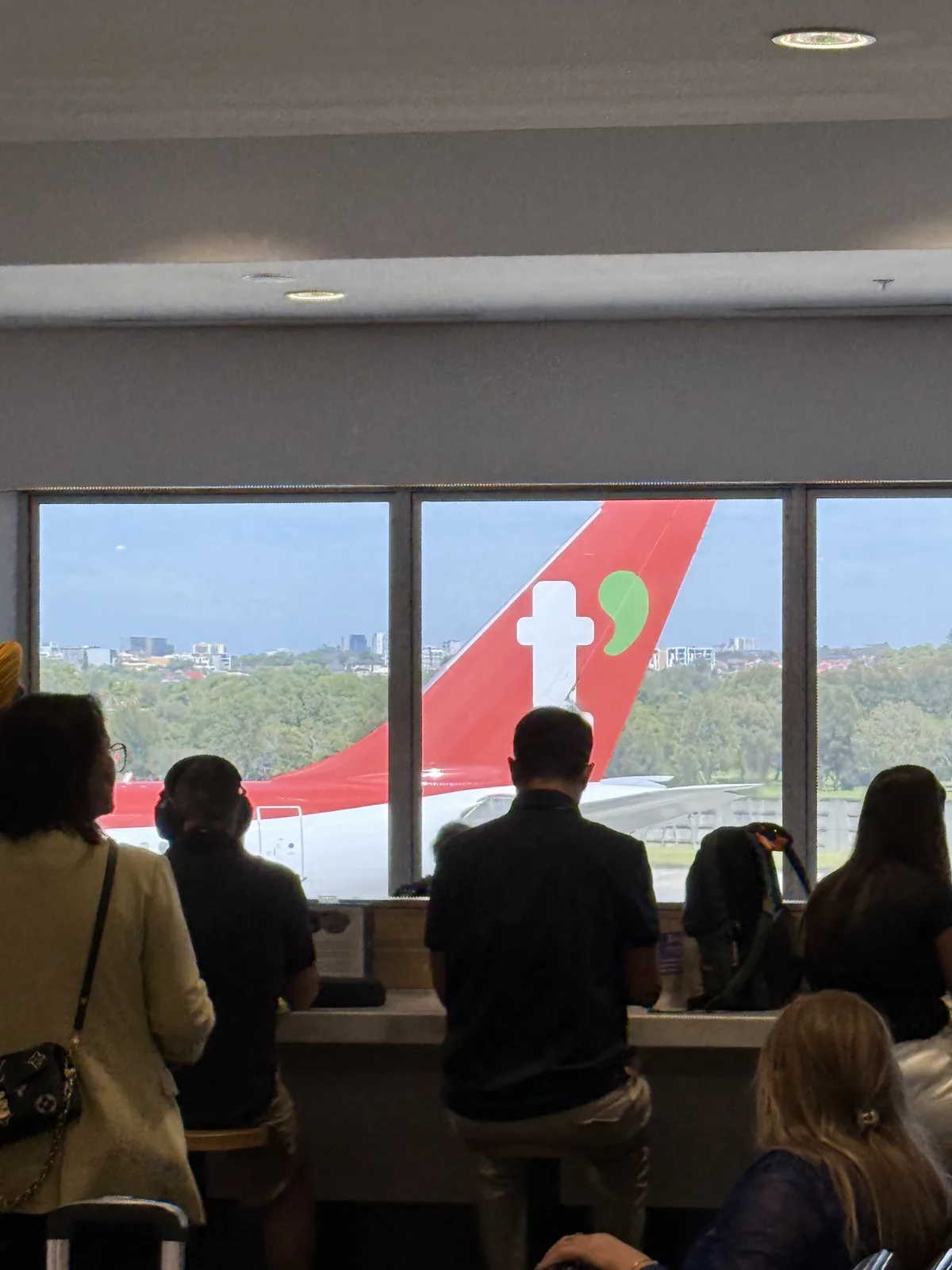 T'way Air aircraft parked on the tarmac at Sydney Airport