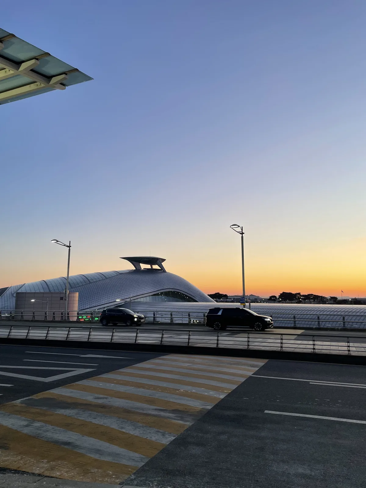 Incheon International Airport Terminal 1 exterior at dawn