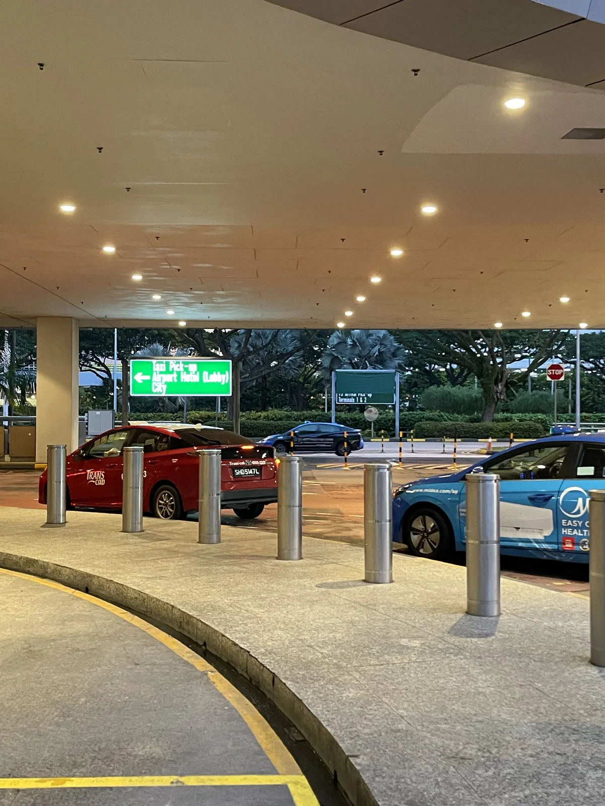 Singapore city street outside Changi Airport during transit excursion