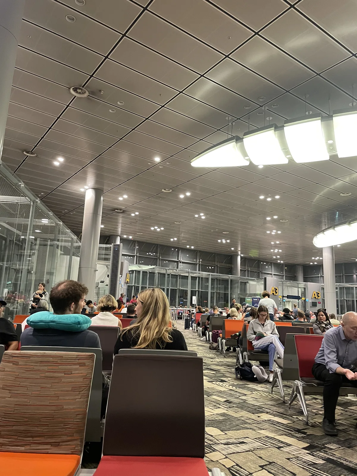 London SQ322 departure gate area at Singapore Changi Airport