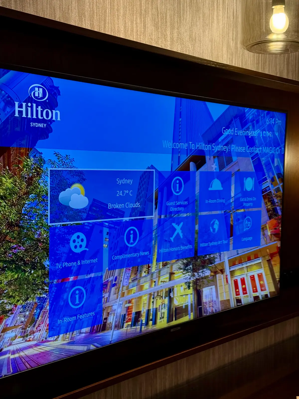 Hilton Sydney room TV showing personalised welcome message on arrival