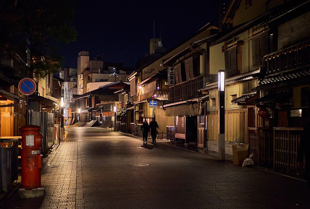 Traditional wooden buildings along a street in Gion, Kyoto, at night